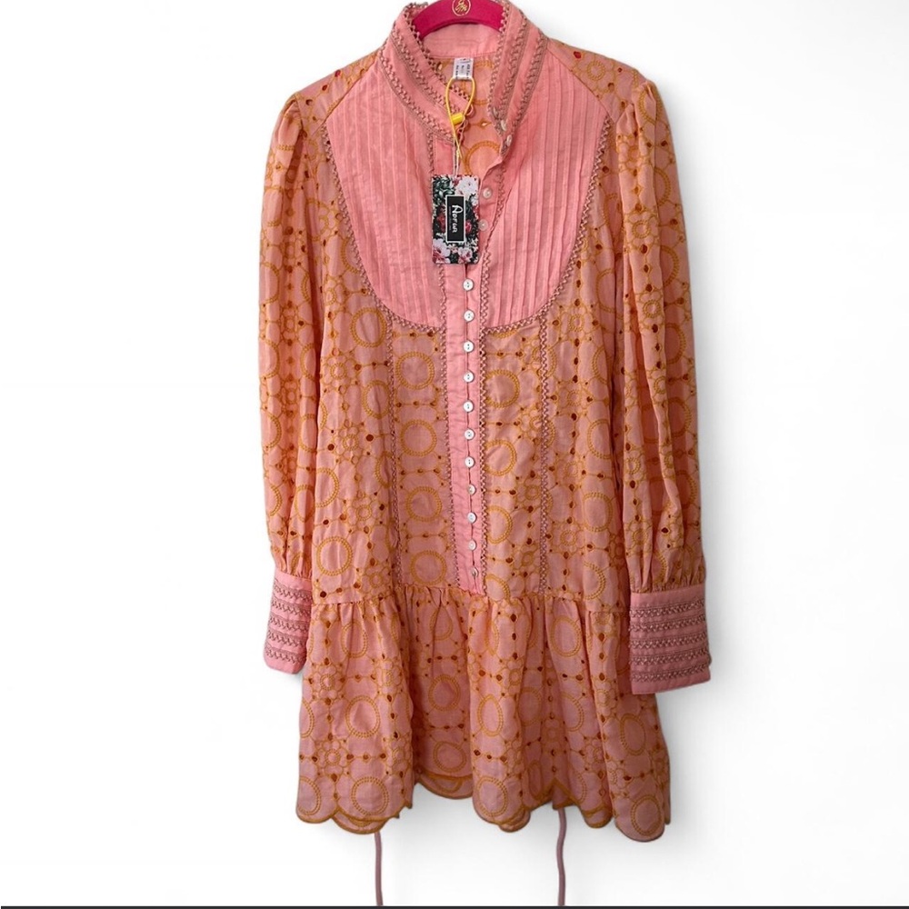 Source Unknown Pink and peach Eyelet Tiered woman’s Dress